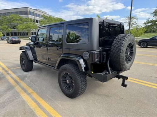Black 2016 Jeep Wrangler Unlimited Sahara