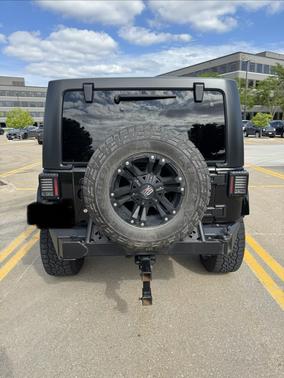 Black 2016 Jeep Wrangler Unlimited Sahara