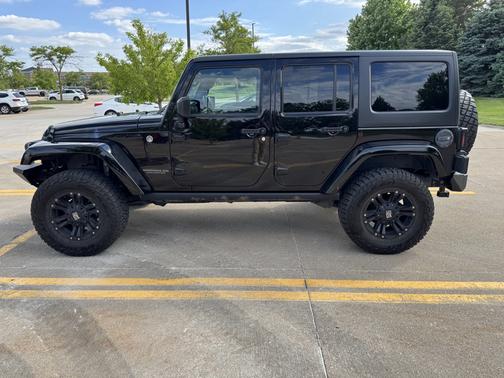 Black 2016 Jeep Wrangler Unlimited Sahara