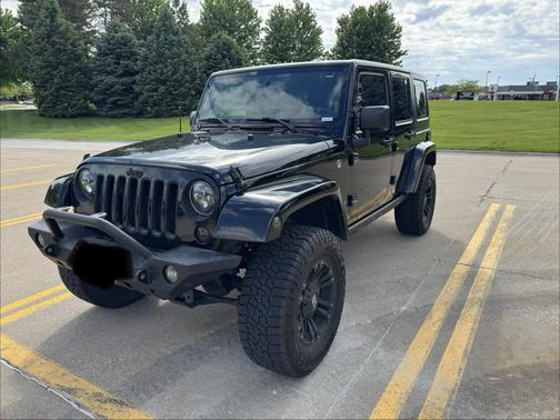 Black 2016 Jeep Wrangler Unlimited Sahara