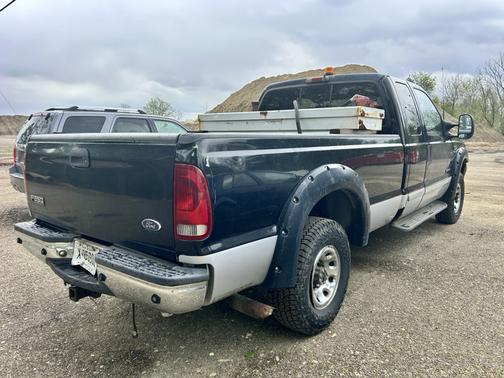 Black 2003 Ford F-250 XLT SuperCab Super Duty