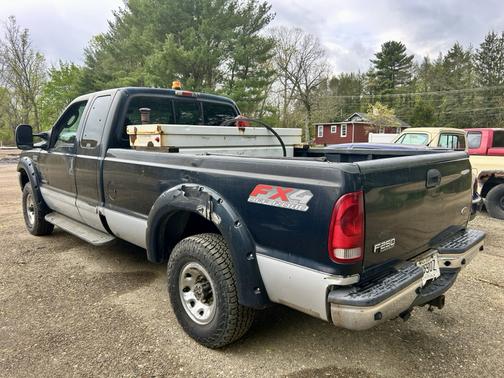 Black 2003 Ford F-250 XLT SuperCab Super Duty