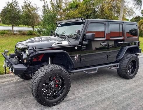 Black 2012 Jeep Wrangler Unlimited Sport