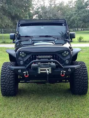 Black 2012 Jeep Wrangler Unlimited Sport