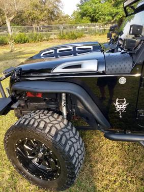 Black 2012 Jeep Wrangler Unlimited Sport