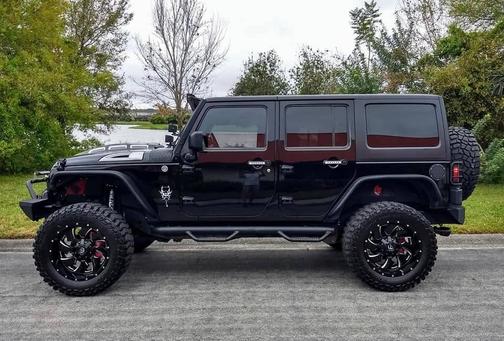 Black 2012 Jeep Wrangler Unlimited Sport