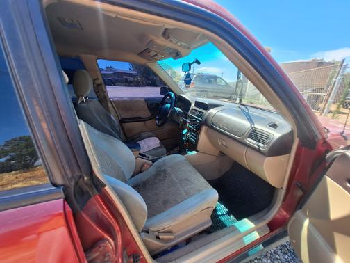 Red 2000 Subaru Forester L