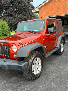 Orange 2014 Jeep Wrangler Sport