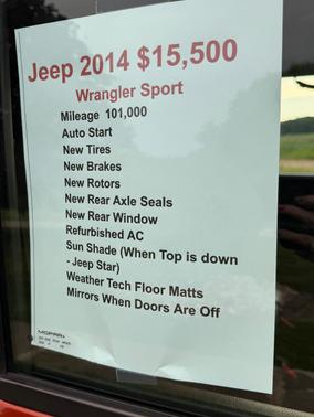 Orange 2014 Jeep Wrangler Sport