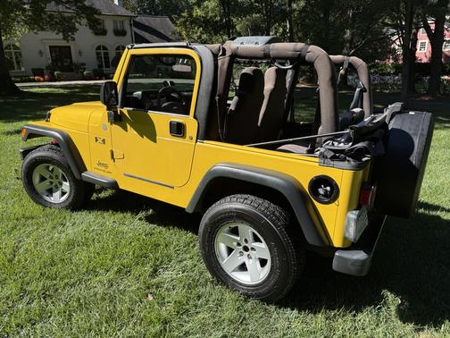 Yellow 2004 Jeep Wrangler X