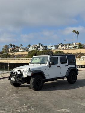 White 2016 Jeep Wrangler Unlimited Sport