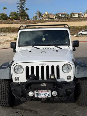 White 2016 Jeep Wrangler Unlimited Sport