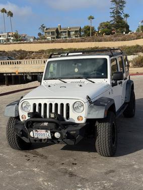White 2016 Jeep Wrangler Unlimited Sport