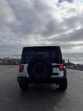 White 2016 Jeep Wrangler Unlimited Sport