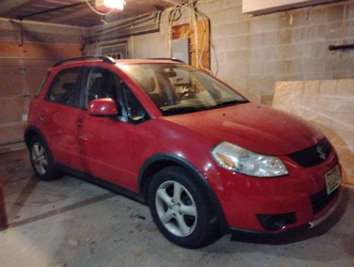 Red 2007 Suzuki SX4 Base