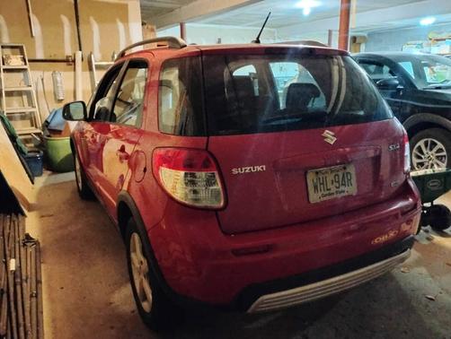 Red 2007 Suzuki SX4 Base