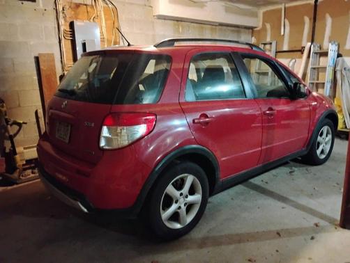 Red 2007 Suzuki SX4 Base
