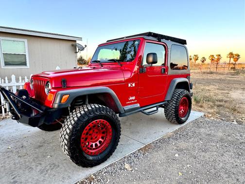 Red 2003 Jeep Wrangler X