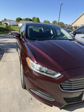 Red 2013 Ford Fusion SE
