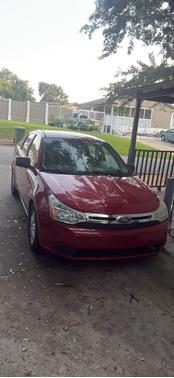 Red 2009 Ford Focus SE