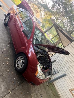 Red 2009 Ford Focus SE