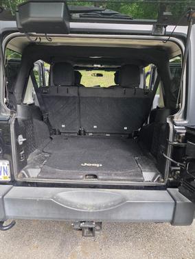 Black 2016 Jeep Wrangler Unlimited Sport