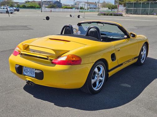 Yellow 2002 Porsche Boxster Boxster
