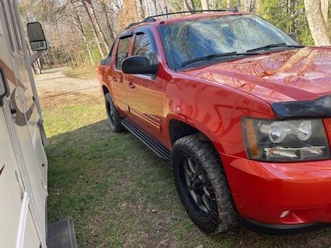 Orange 2011 Chevrolet Avalanche 1500 LT