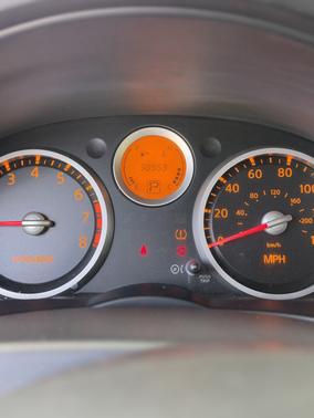 Red 2009 Nissan Sentra 2