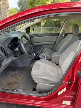 Red 2009 Nissan Sentra 2