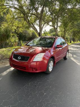 Red 2009 Nissan Sentra 2