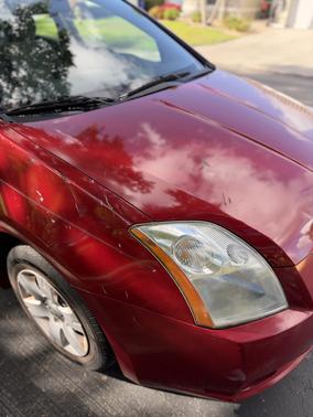 Red 2009 Nissan Sentra 2