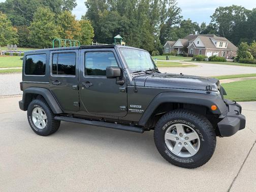 Gray 2014 Jeep Wrangler Unlimited Sport