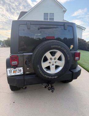 Gray 2014 Jeep Wrangler Unlimited Sport