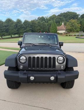 Gray 2014 Jeep Wrangler Unlimited Sport
