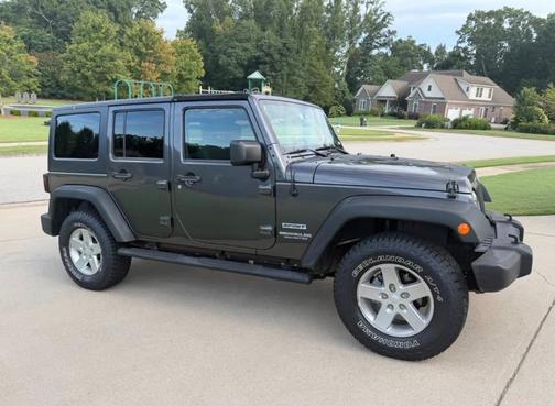 Gray 2014 Jeep Wrangler Unlimited Sport