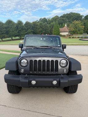 Gray 2014 Jeep Wrangler Unlimited Sport
