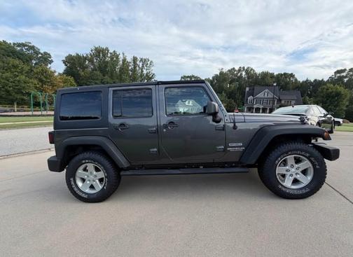 Gray 2014 Jeep Wrangler Unlimited Sport