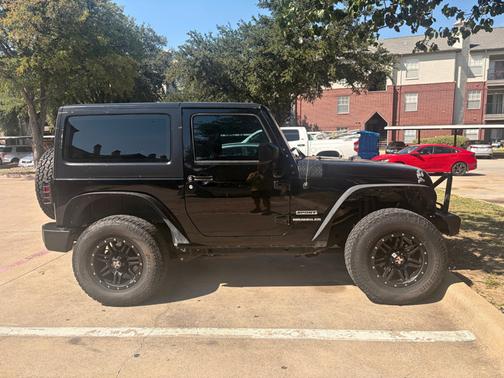 Black 2016 Jeep Wrangler Sport