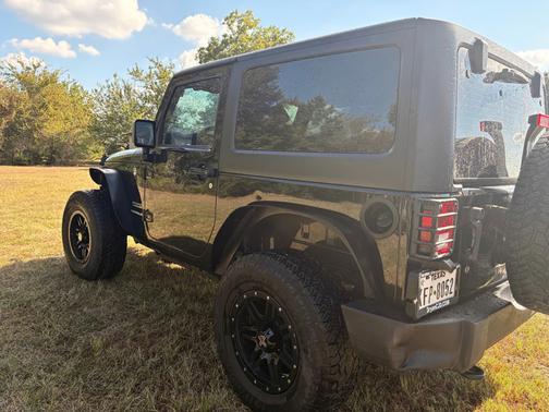 Black 2016 Jeep Wrangler Sport