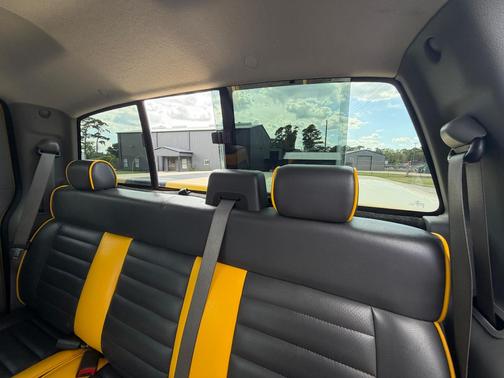 Yellow 2006 Ford F-150 XLT SuperCab