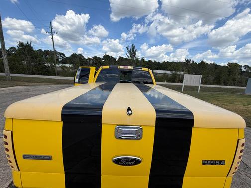 Yellow 2006 Ford F-150 XLT SuperCab