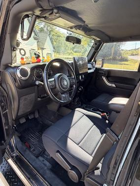 Black 2011 Jeep Wrangler Unlimited Sahara