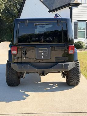 Black 2011 Jeep Wrangler Unlimited Sahara