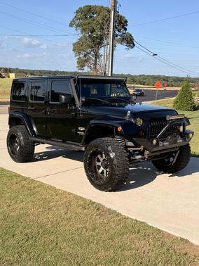 Black 2011 Jeep Wrangler Unlimited Sahara