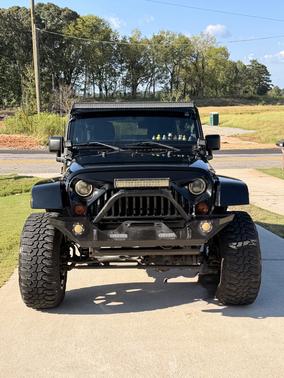 Black 2011 Jeep Wrangler Unlimited Sahara