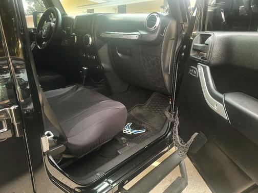 Black 2011 Jeep Wrangler Unlimited Sahara