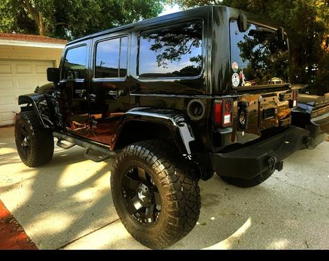 Black 2011 Jeep Wrangler Unlimited Sahara
