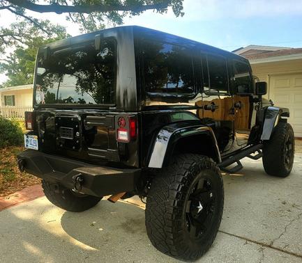 Black 2011 Jeep Wrangler Unlimited Sahara