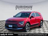 Thumbnail of 2025 Runway Red Kia Niro